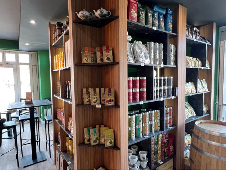 Shelf with a selection of teas and spices
